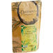 A brown bag of Davidson's Organic Winter Fruit and Flowers Herbal Loose Leaf Tea with a green and yellow label.