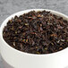 A bowl of Davidson's Organic Earl Grey with Lavender Loose Leaf Tea.
