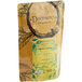 A brown bag of Davidson's Organic Russian Caravan Loose Leaf Tea with a yellow label with green text.