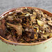 A bowl of Davidson's Organic White Spicy Peach dried leaves.