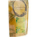 A brown bag of Davidson's Organic Berry Essence Herbal Loose Leaf Tea with green and yellow text.