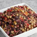 A bowl of Davidson's Organic Berry Essence loose leaf tea.