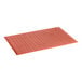 A red rubber anti-fatigue floor mat with holes.