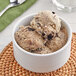 A bowl of The Cookie Dough Cafe Cookies and Cream Cookie Dough.