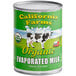 A green and white California Farms can of organic evaporated milk with a cow on it.