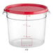 A clear plastic Vigor food storage container with a red lid.