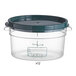 A clear Vigor plastic food storage container with a green lid.