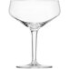 A clear Schott Zwiesel coupe glass with a stem.