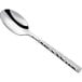 Oneida stainless steel demitasse spoon with a hammered handle.