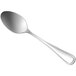 A Oneida New Rim II stainless steel spoon with a silver handle on a white background.