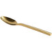 A close-up of a Oneida Chef's Table Gold stainless steel demitasse spoon with a long handle.