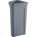 A Lavex gray plastic corner round trash can with a gray lid.