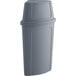 A grey plastic Lavex corner round trash can with a grey push door lid.