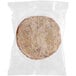 A plastic bag of Outer Aisle Everything-Seasoned Cauliflower Sandwich Thins with a round, frost-covered object inside.