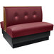 An American Tables & Seating red standard double booth with a tufted back.