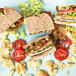 A sandwich with lettuce and Tofurky Vegan Hickory Turk'y Deli Slices.