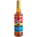A Torani Brown Sugar Cinnamon flavoring syrup 750 mL plastic bottle with a red label.