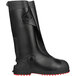 A Tingley black work boot overshoe with red soles.