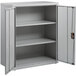 A light gray metal storage cabinet with two shelves and open doors.