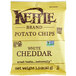 A yellow and white bag of Kettle Brand White Cheddar Potato Chips.