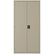 A grey steel Hirsh Industries wardrobe cabinet with black handles and two doors.