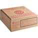 A white cardboard box with red text reading "Eli's Cheesecake Old Fashioned Triple-Chocolate Cake"