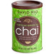 A green and brown can of David Rio Tortoise Green Tea Chai Latte Mix.
