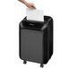 A hand putting a piece of paper into a Fellowes Powershred LX210 black micro-cut shredder.