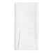 A white hemmed cloth napkin folded in half on a white background.