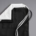 A black polyester bib apron with white pockets and ties.