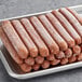 A tray of frozen Field Roast plant-based hot dogs.