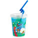 A plastic Choice Jungle print kid's cup with a blue lid and straw with animals on it.