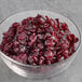 A bowl of Ocean Spray Craisins dried cranberries.