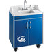 A blue and white Ozark River Manufacturing Lil Splasher portable hot water hand sink in a laminate cabinet.