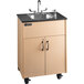 A Premier 1 portable hot water hand sink with a laminate cabinet on wheels.