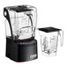 A Blendtec commercial blender with two FourSide jars on a counter.