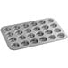 A Choice carbon steel mini muffin pan with 24 holes.