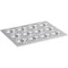 A silver Choice aluminum muffin pan with twelve holes.