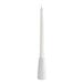 A white porcelain taper candle holder with a tall white taper candle.
