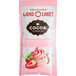 A pink Land O Lakes package of strawberry and white chocolate cocoa mix.