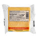 A package of Follow Your Heart Dairy-Free Vegan Sliced Medium Cheddar Cheese with a label in a plastic bag.