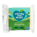 A package of Follow Your Heart Dairy-Free Vegan Sliced Mozzarella Cheese on a white surface.