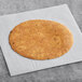 A round brown Mr. Tortilla Low Carb tortilla on white paper.