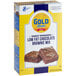A box of Gold Medal Low-Fat Chocolate Brownie Mix with a brownie with a crumbly crust.