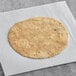 A Mr. Tortilla low carb tortilla on white paper.
