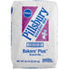 A white Pillsbury Bakers' Plus Brownie Mix bag with blue and white text.
