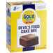 A box of Gold Medal Devil's Food Cake Mix on a table in a grocery store aisle.