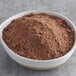 A bowl of brown Gold Medal Chocolate Chocolate Cake mix powder.