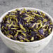 A bowl of Wild Hibiscus whole dried butterfly pea flowers.