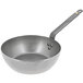 A de Buyer Mineral B Element carbon steel stir fry pan with a handle.